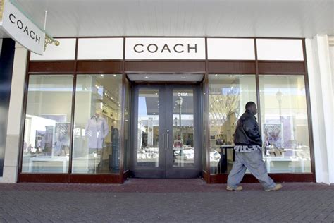 michael kors parent company|coach bought michael kors.